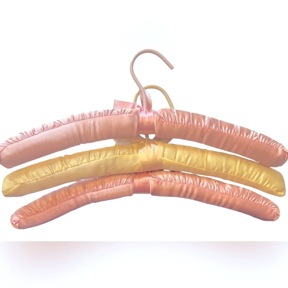 Three Luxurious Padded Satin Hangers-2 Pink and 1 Yellow Hanger.